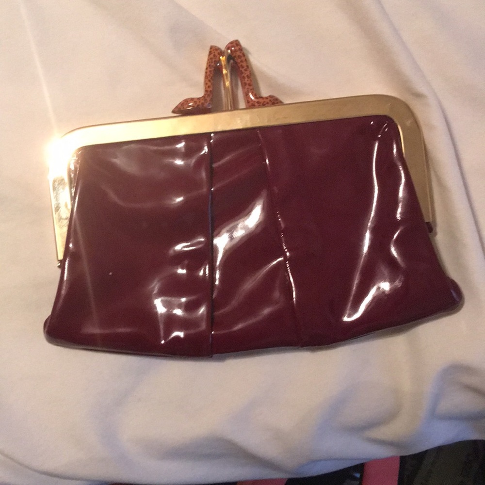 Burgundy leather clutch